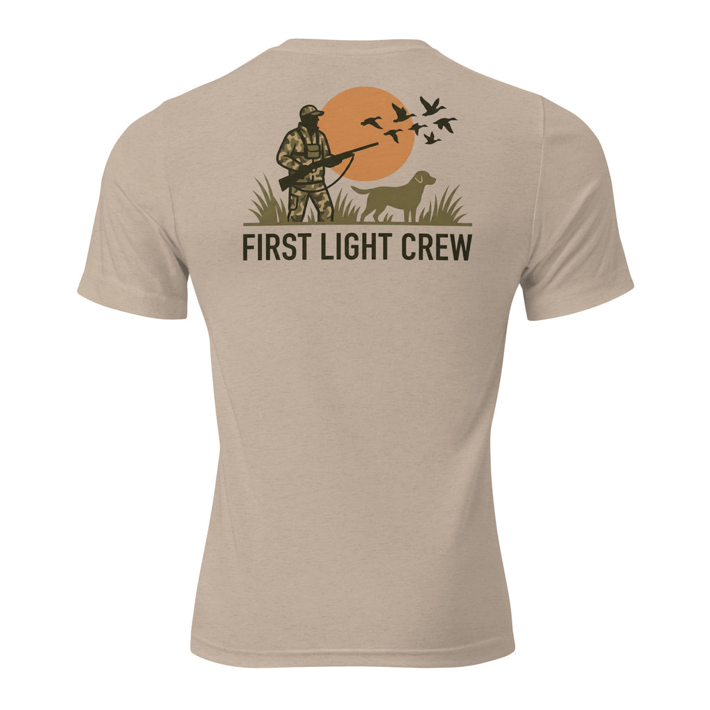 Men's First Light Crew Waterfowl Tee in Tan Triblend showing hunter and retriever silhouette with ducks and sunrise