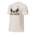 Side view of the Men's Paddle Country Moose Tee in Heather Dust showing the Dark Timber arm emblem