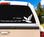 Full-scale 11" white duck decal installed on a rear truck window, standing out with bold lines and all-weather durability.